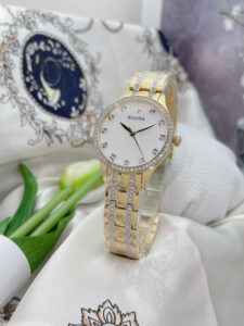 Đồng hồ Bulova nữ màu vàng đính đá Mặt xà cừ trắng 98X119